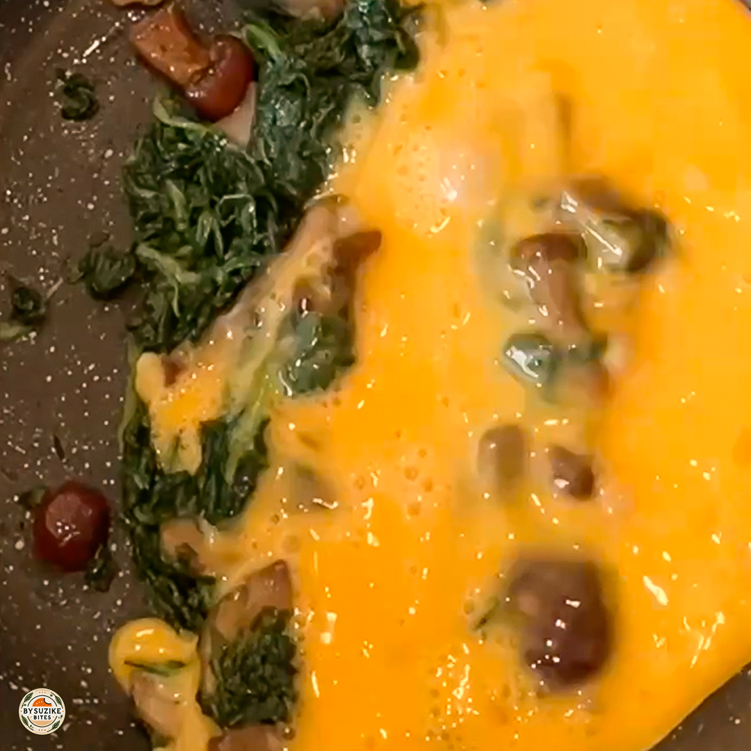 Breakfast Low carb eggs mushrooms 4 Cheesy eggplant lasagna served with green beans on a white plate β a low carb, keto-friendly meal idea