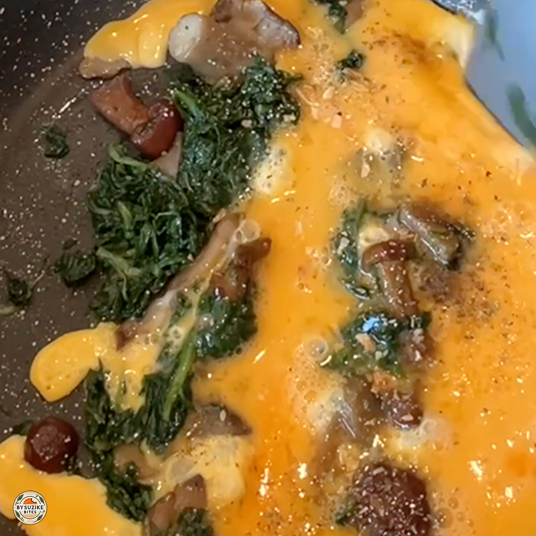 Breakfast Low carb eggs mushrooms 5 Cheesy eggplant lasagna served with green beans on a white plate β a low carb, keto-friendly meal idea