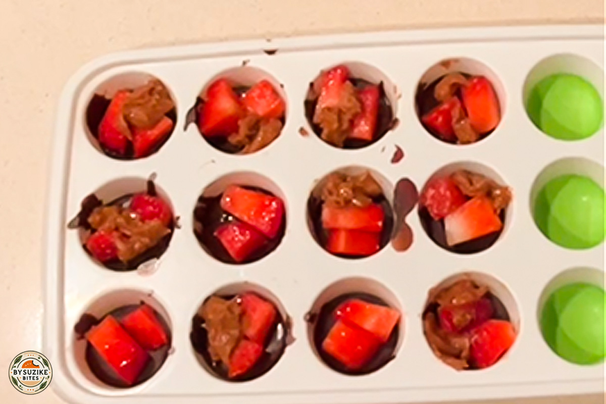 Strawberry PB Bonbons 5 Cheesy eggplant lasagna served with green beans on a white plate โ a low carb, keto-friendly meal idea