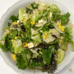 10-minute feta and tuna salad with corn and red onion in a large bowl, drizzled with oregano vinaigrette