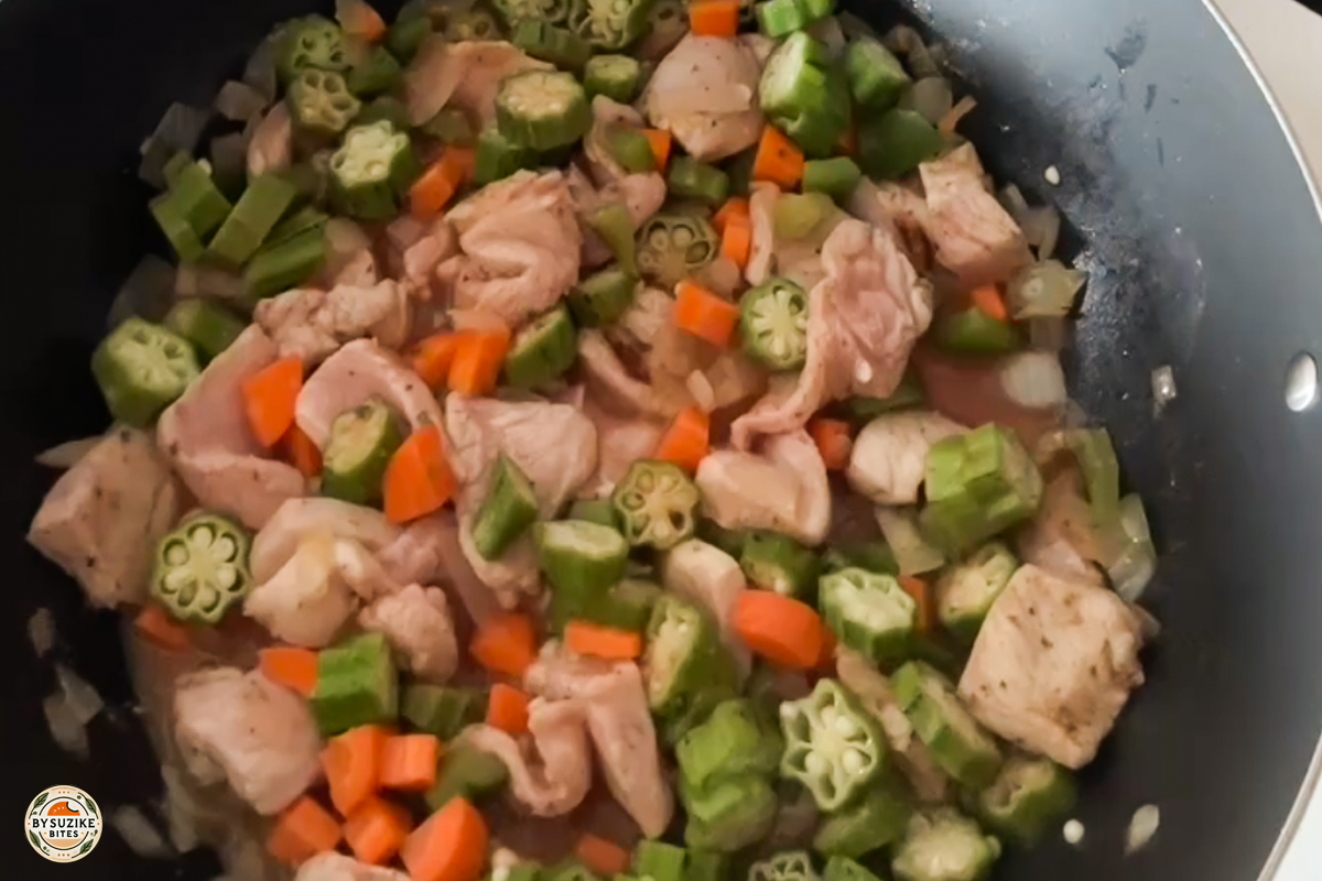 pork-with-okra-step-10-adding-vegetables-pork Step 10: Adding pork, okra and vegetables to the pan